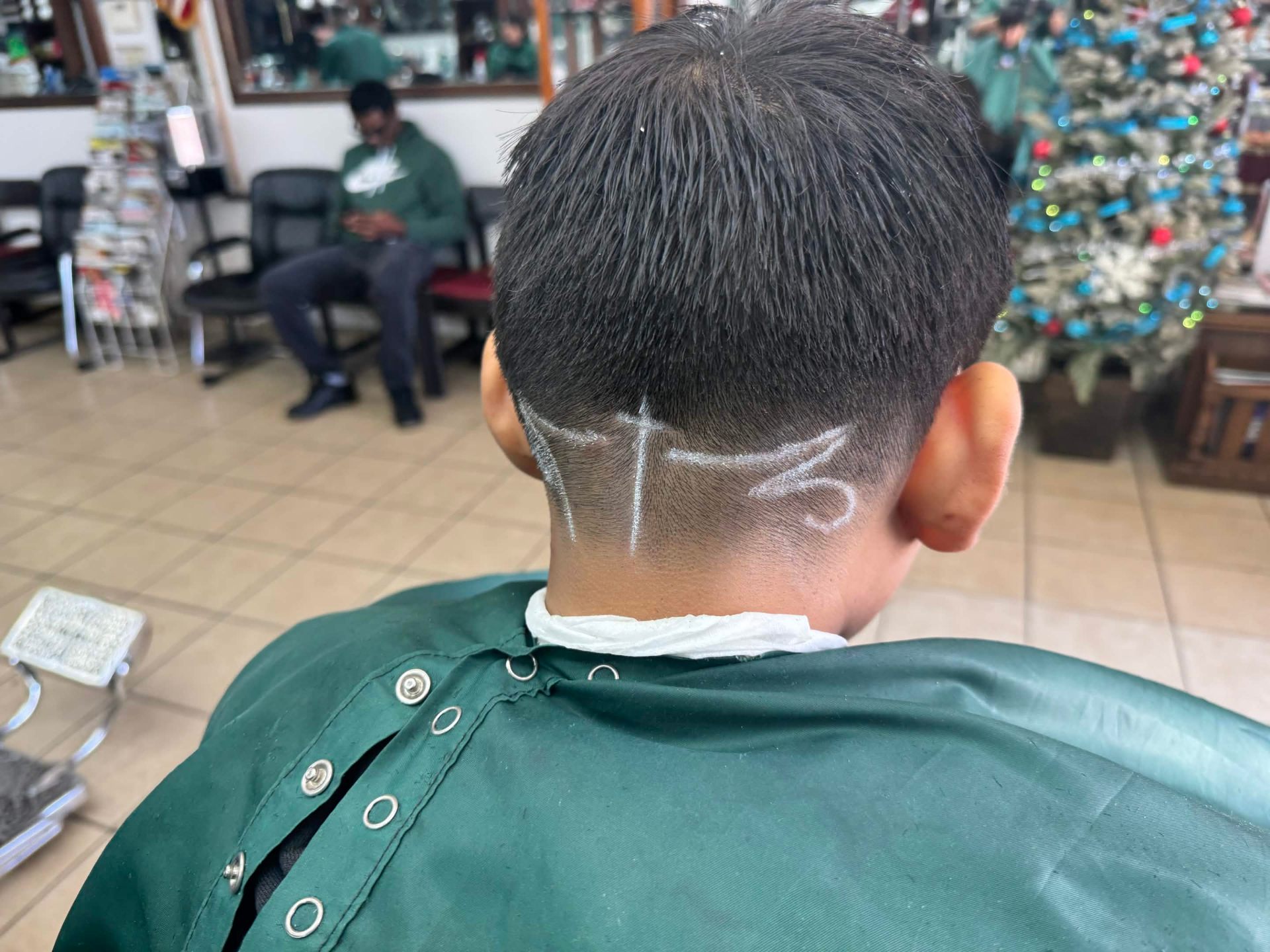 Custom hair design with sharp fade