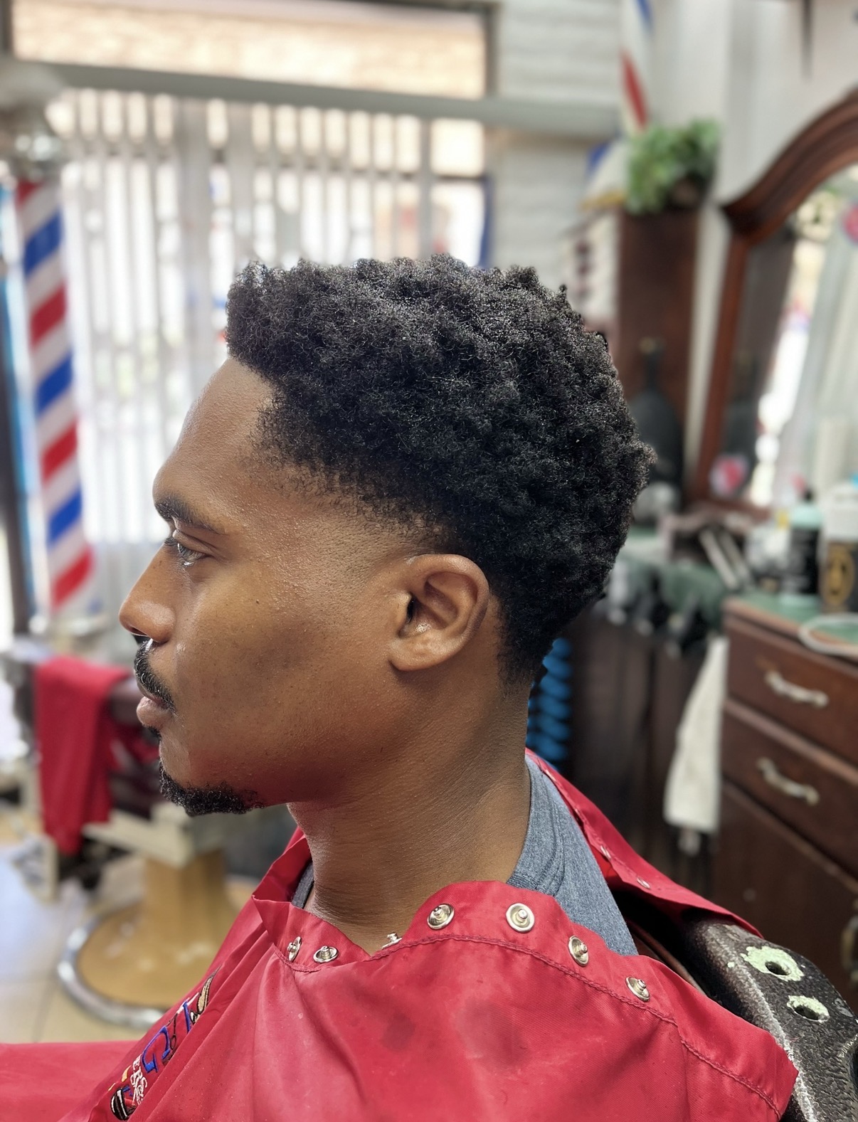 Natural afro shape-up with taper